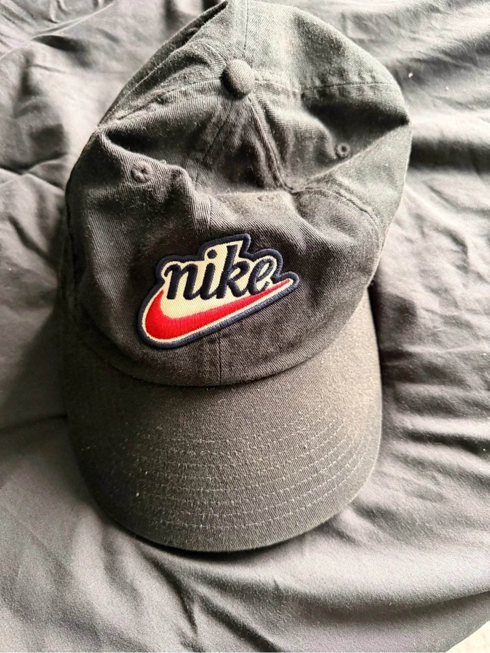 Nike Black Baseball Cap with Red and White Swoosh Patch